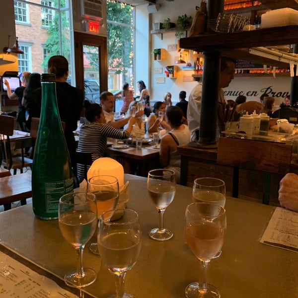 Photo taken at St Tropez Restaurant &amp; Wine Bar by Ashley E. on 8/21/2019
