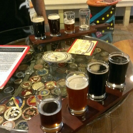 Photo taken at Chain O&#39;Lakes Brewing Company by Megan K. on 5/28/2014