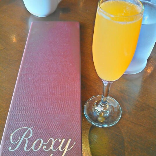 Photo taken at Roxy Restaurant and Bar by Gaby F. on 11/18/2012
