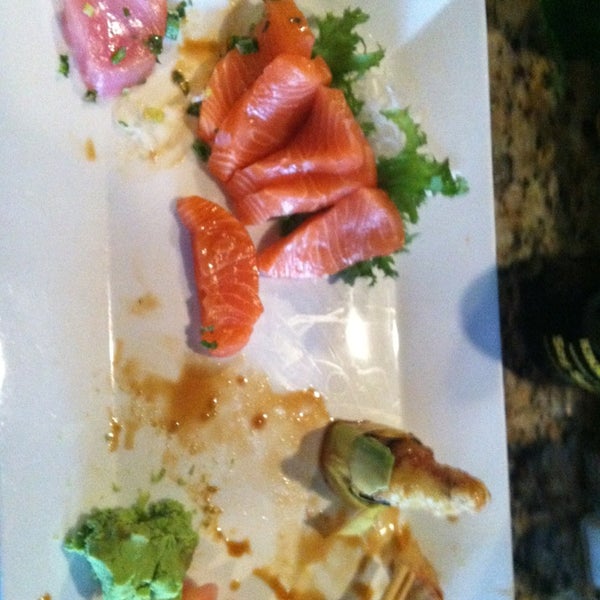Photo taken at Tokyo Sushi Restaurant by Adriane C. on 1/17/2014