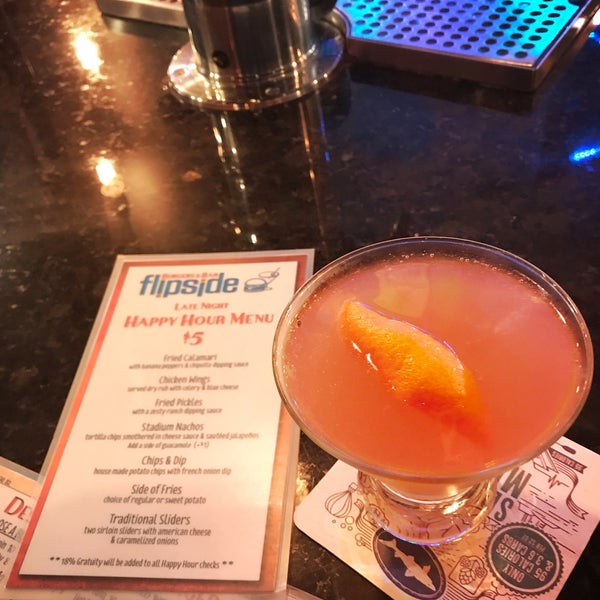 Photo taken at Flipside Burgers &amp; Bar by Amy K. on 9/6/2019