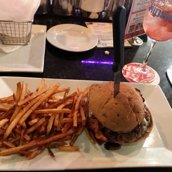 Photo taken at Flipside Burgers &amp; Bar by Amy K. on 1/23/2020