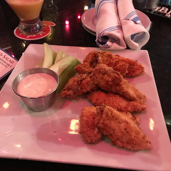 Photo taken at Flipside Burgers &amp; Bar by Amy K. on 12/6/2019