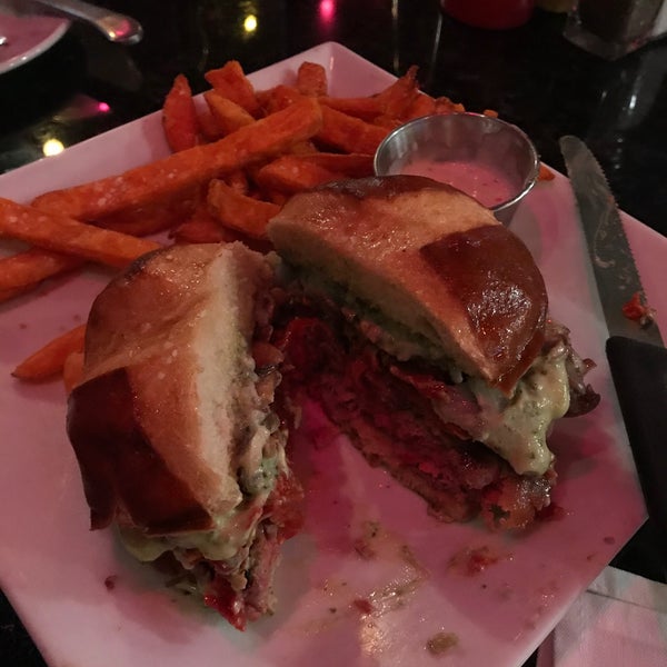 Photo taken at Flipside Burgers &amp; Bar by Amy K. on 12/6/2019