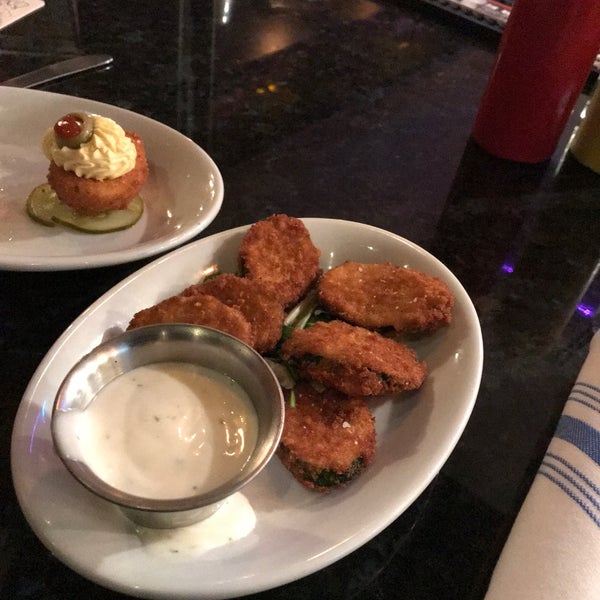 Photo taken at Flipside Burgers &amp; Bar by Amy K. on 10/25/2019