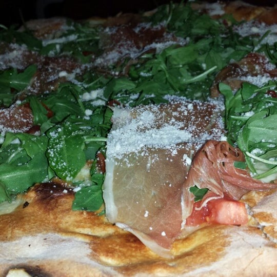 Photo taken at Pizza Mezzaluna by Win L. on 10/25/2013