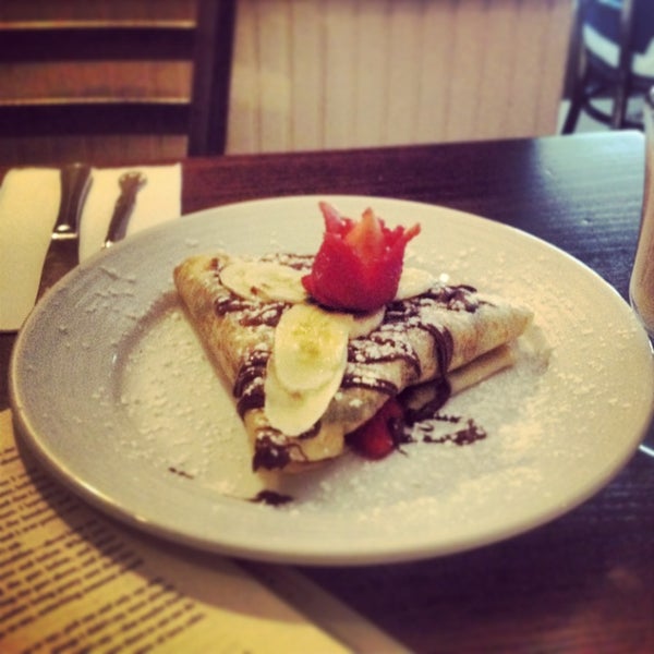 Photo taken at Yorkville Creperie by Whitney S. on 8/3/2013
