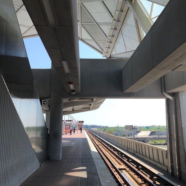 Photo taken at Tysons Metro Station by Ryan on 5/8/2018
