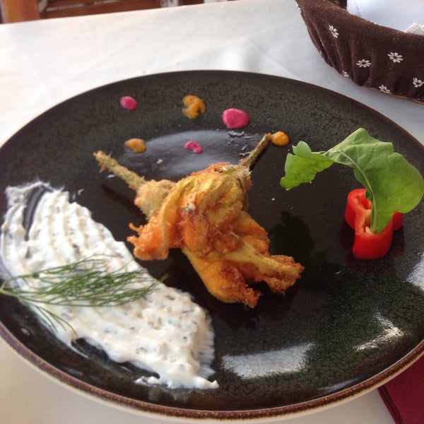 Photo taken at Tymnos Restaurant by Ayse C. on 7/29/2019