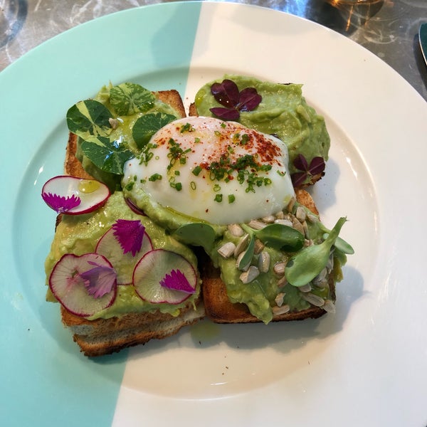 Add the poached egg to the avo toast - you won’t be disappointed