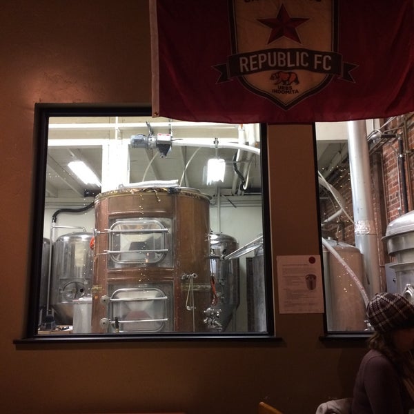 Photo taken at New Helvetia Brewing Co. by Zachary K. on 12/27/2014