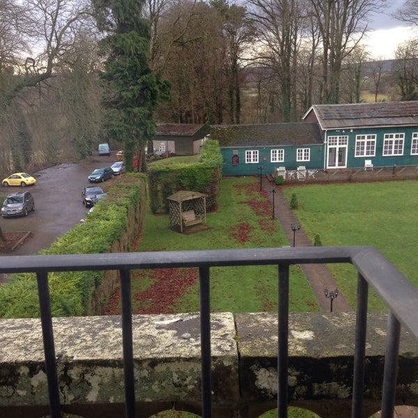 Photo taken at Coed-Y-Mwstwr Hotel by Philip L. on 1/17/2014
