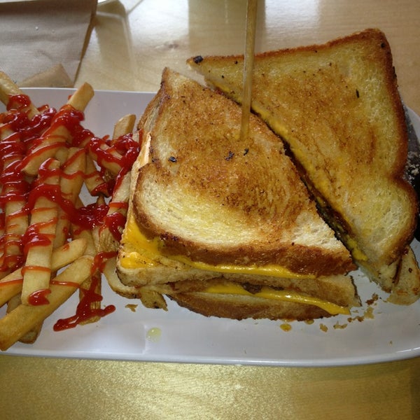 Photo taken at Crave Real Burgers by Jazz W. on 2/3/2013