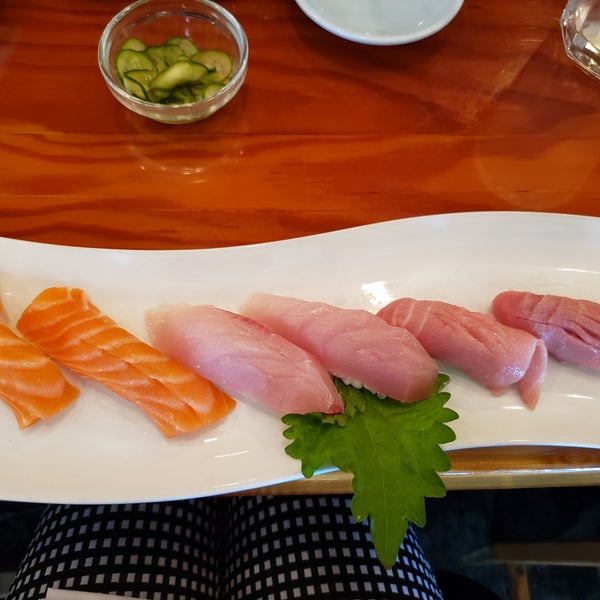 Photo taken at Koi Japanese Cuisine by Kelley L. on 4/2/2019