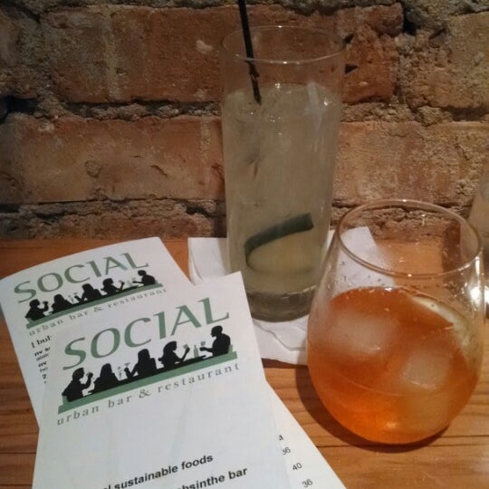 Photo taken at Social Urban Bar &amp; Restaurant by Tony P. on 7/12/2014