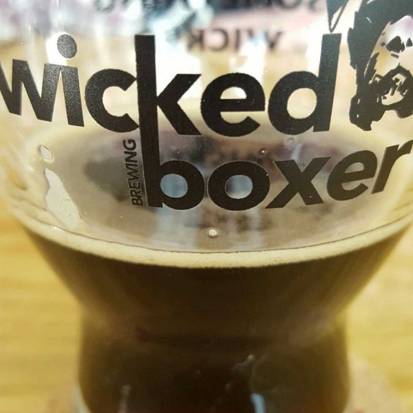 Photo taken at Wicked Boxer Brewing by Amy B. on 12/17/2017