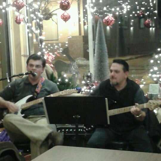 Photo taken at Wired Cafe by Crystal D. on 12/8/2012