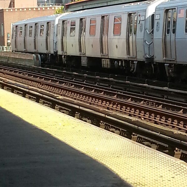Photo taken at MTA Subway - M Train by Peter R. on 9/13/2013