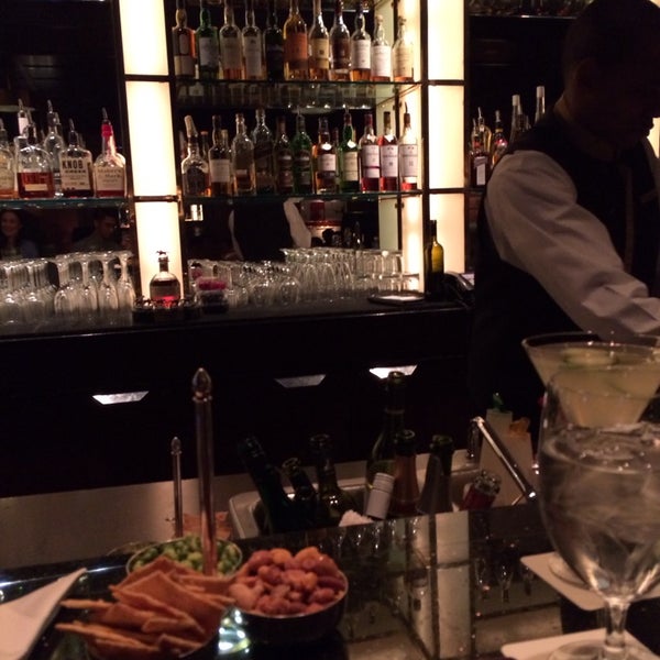 Photo taken at The Bar at The Peninsula by Jeremy L. on 1/19/2014