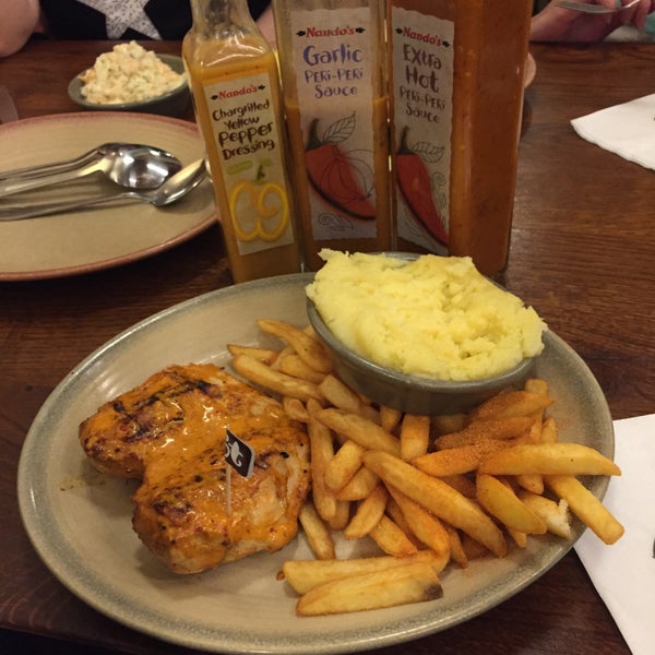 Photo taken at Nando&#39;s by Sharrie L. on 9/9/2015