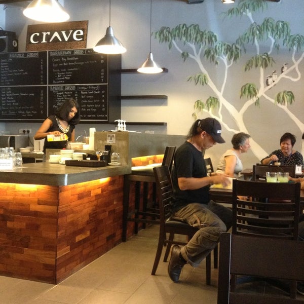 Photo taken at Crave Cafe by Naaiemah M. on 6/28/2013