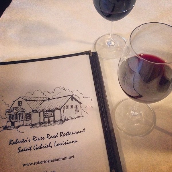 Foto tirada no(a) Roberto&#39;s River Road Restaurant por Jacob L. em 3/11/2014