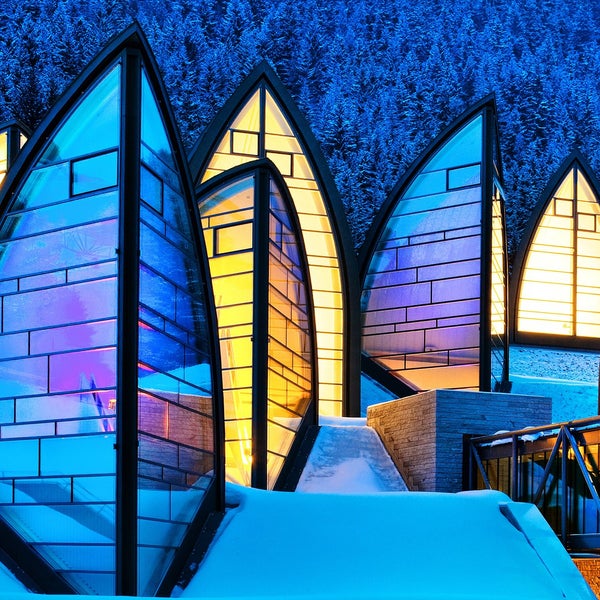 The Tschuggen Grand Hotel is known for its 5,000-square-meter Mario Botta-designed Tschuggen Bergoase Spa. Built directly into the mountain, the spa is connected to the hotel by a glass walkway!