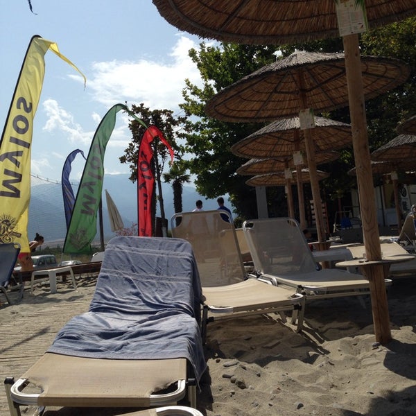 Photo taken at Mylos Beach Bar by Konstantinos G. on 7/8/2014