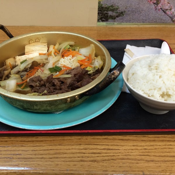 Photo taken at Tensuke Market &amp; Sushi Cafe by Chris P. on 12/20/2014