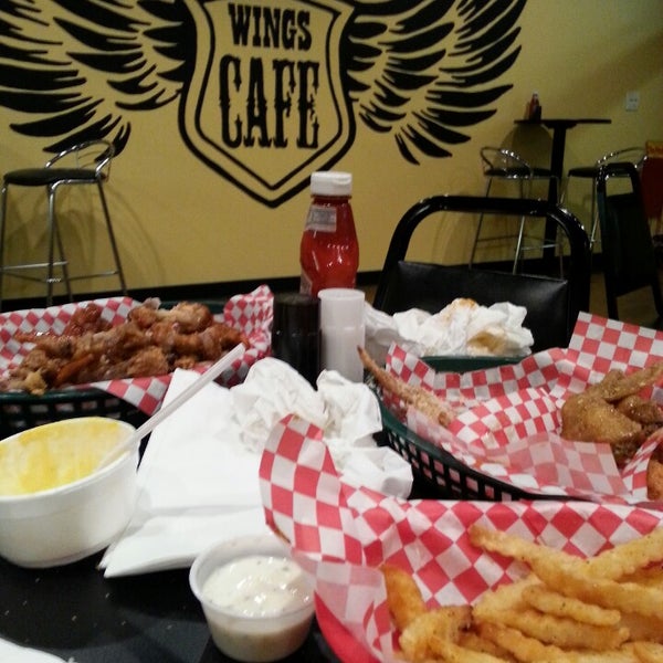 Photo taken at Wings Cafe by Jessica B. on 8/23/2013