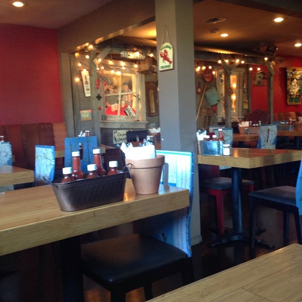 Photo taken at Ragin Cajun Cafe by Paula C. on 11/19/2014