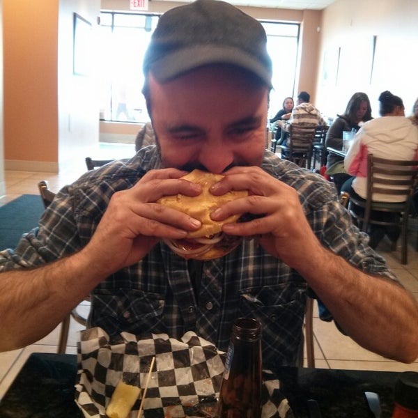 Photo taken at My Burger Bar Catering by Mike B. on 4/20/2013