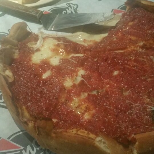 Photo taken at Nancy&#39;s Chicago Pizza by Marro M. on 6/21/2016