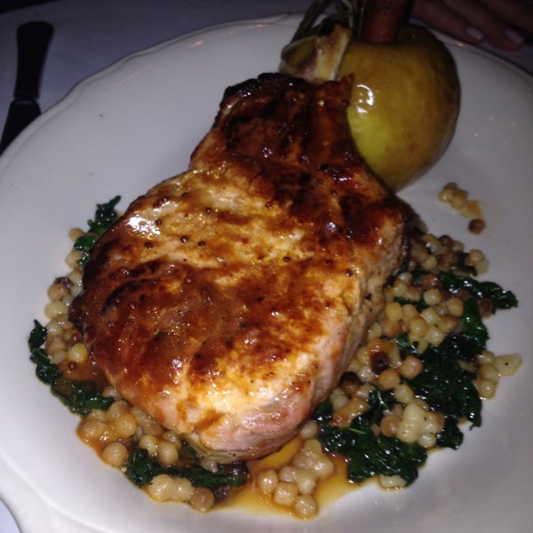 Grilled pork chop was perfectly prepared and uniquely served with baked apple