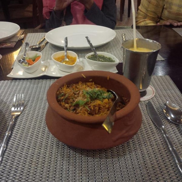 Photo taken at Queen&#39;s Tandoor Indian &amp; Fusion Cuisine by Dida A. on 6/5/2015