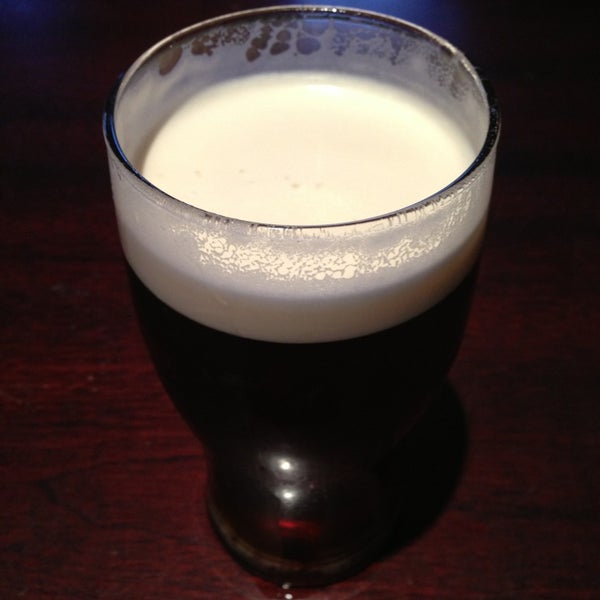 Photo taken at Jinty McGuinty&#39;s Irish Bar by simon l. on 8/8/2013