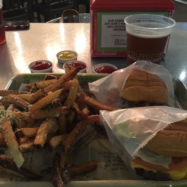 Photo taken at BurgerFi by Jason B. on 10/4/2014
