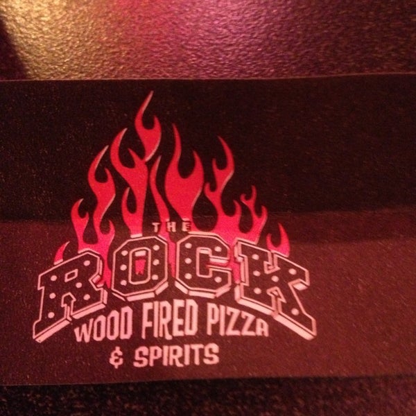 Photo taken at The Rock Wood Fired Pizza by Andy G. on 2/23/2013