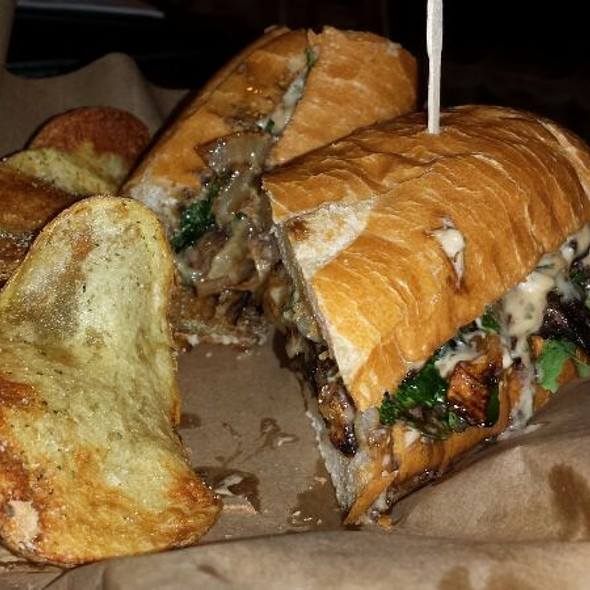 Holy Cow!  Amazing skirt steak sandwich with Gorgonzola, caramelized onions and arugula.  So tender and flavorful..delicious perfection!  Did I say I liked it??