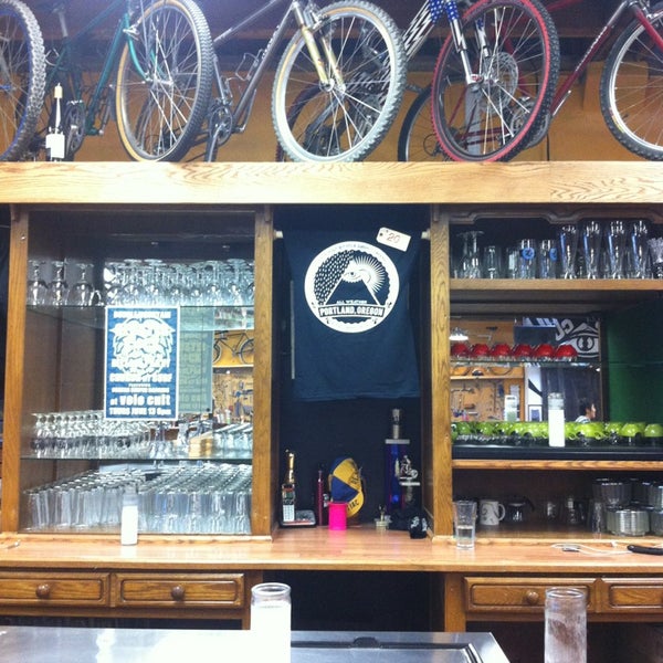 Photo taken at Velo Cult Bicycle Shop &amp; Bar by Kaitlin on 6/9/2013