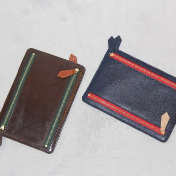 Be sure to get your hands on one of these travel wallets made for FL!