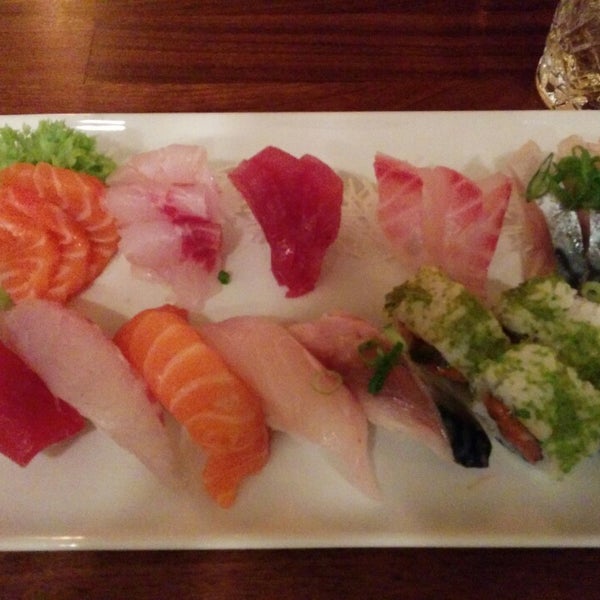 Photo taken at Tomo Sushi by Luciano R. on 1/5/2015
