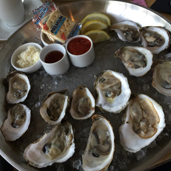 Photo taken at SILO Terrace Oyster Bar by Gil G. on 8/9/2015