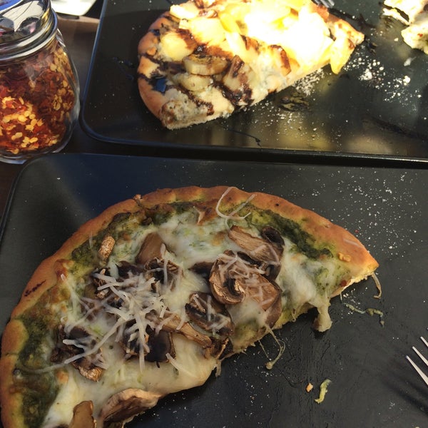 Amazing flatbreads! Happy hour special from 12 till 7 on Saturday. Pictured: pesto & mushroom and pineapple & gorgonzola