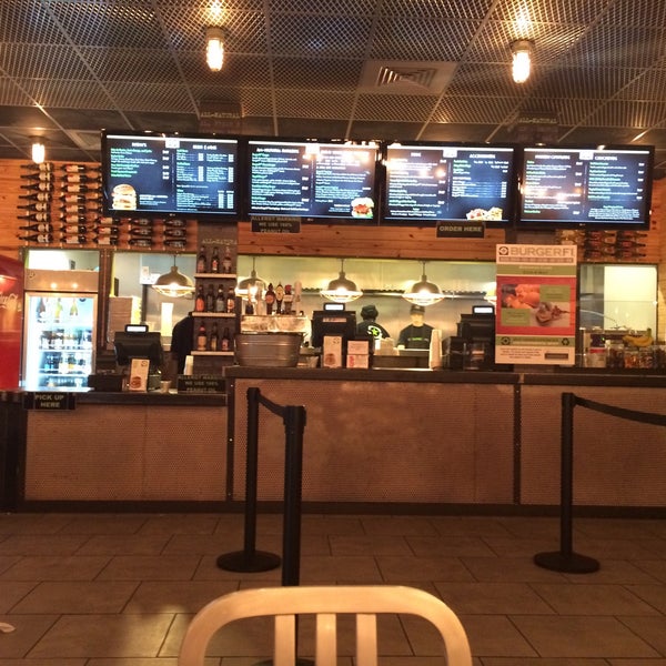 Photo taken at BurgerFi by Kada O. on 1/16/2015