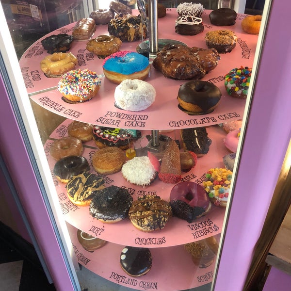 Photo taken at Voodoo Doughnut by Andrew D. on 8/10/2021