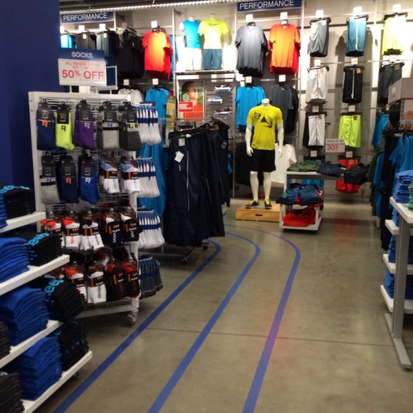 Photo taken at Reebok Outlet by Manoel F. on 4/2/2014
