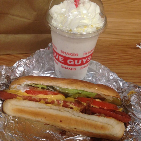 Photo taken at Five Guys by Can O. on 9/6/2015