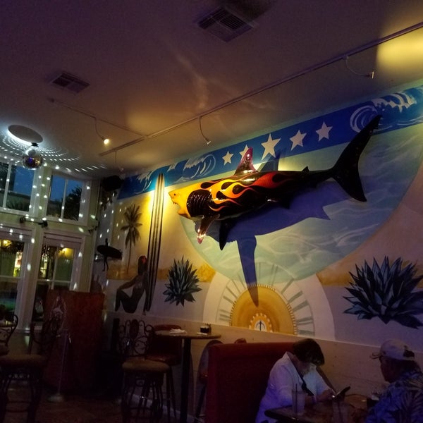 Photo taken at Shark Shack Beach Bar &amp; Grill by Drew K. on 6/29/2018
