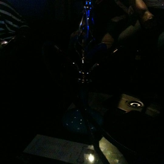 Photo taken at Oasis Liquid (Hookah Lounge) by Chiniecia P. on 4/22/2012